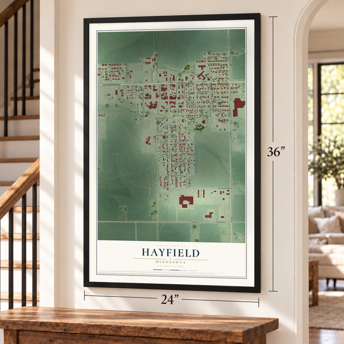 Hayfield, Minnesota map, 24 x 36 inch print in a black frame by a staircase
