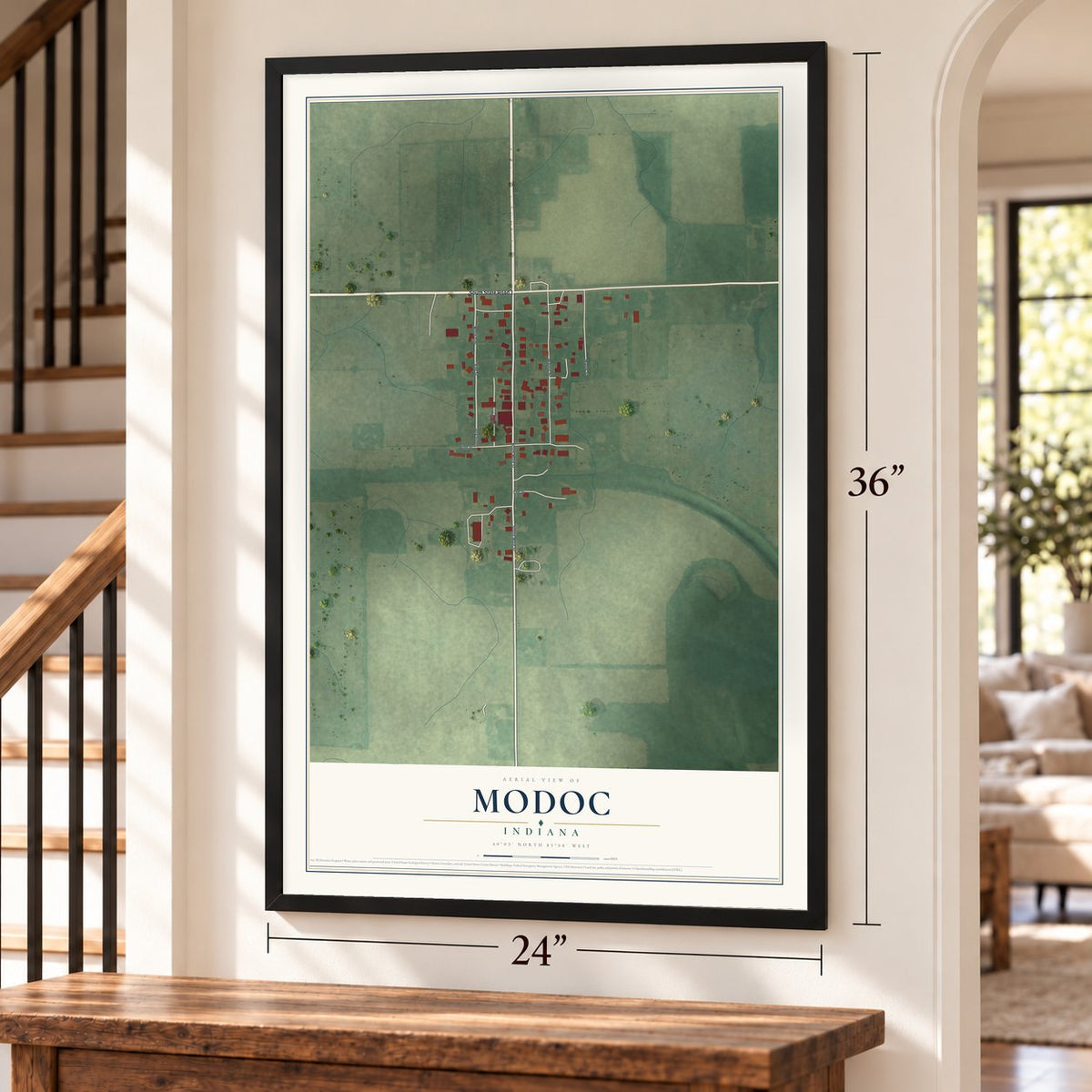 Modoc, Indiana map, 24 x 36 inch print in a black frame by a staircase