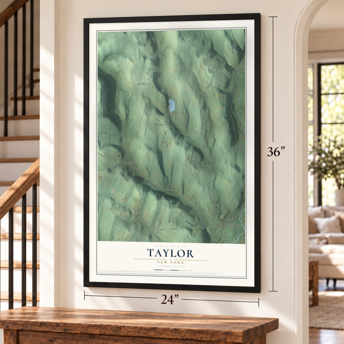 Taylor, New York map, 24 x 36 inch print in a black frame by a staircase