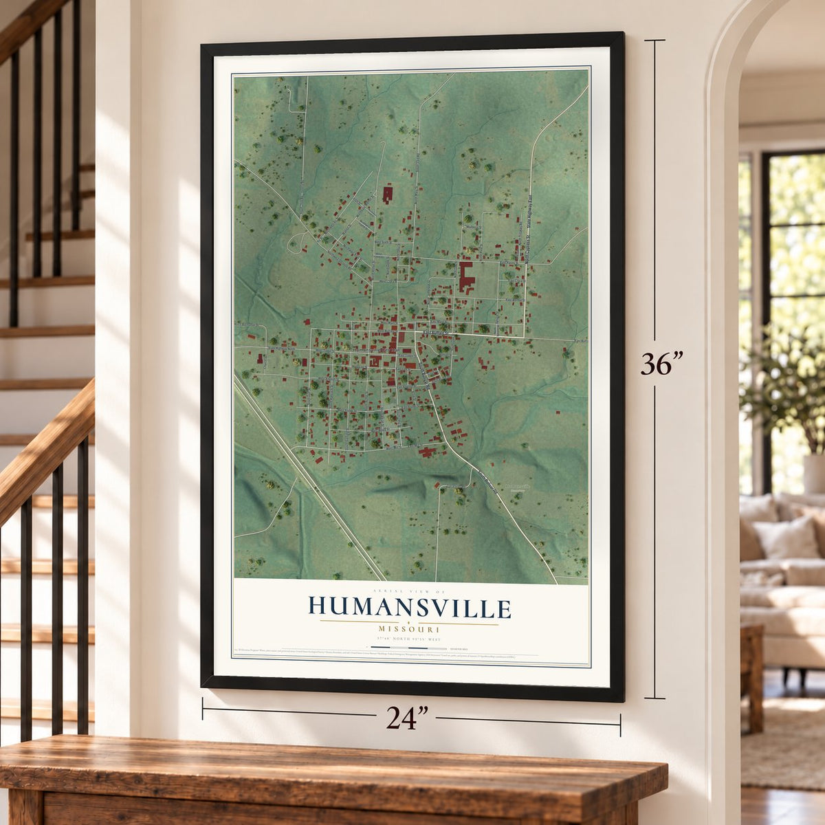 Humansville, Missouri map, 24 x 36 inch print in a black frame by a staircase