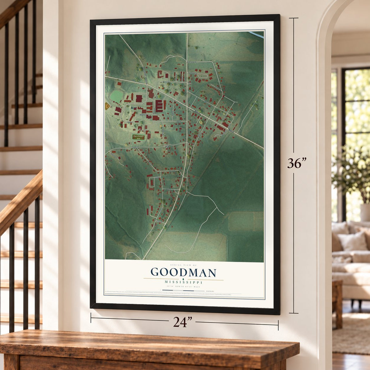 Goodman, Mississippi map, 24 x 36 inch print in a black frame by a staircase