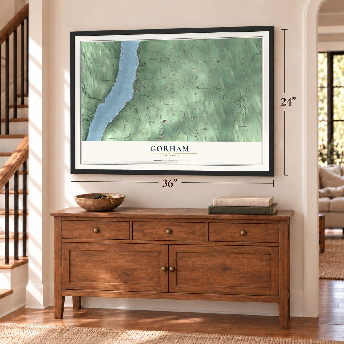 Gorham, New York map, 24 x 36 inch print in a black frame above a dresser by a staircase