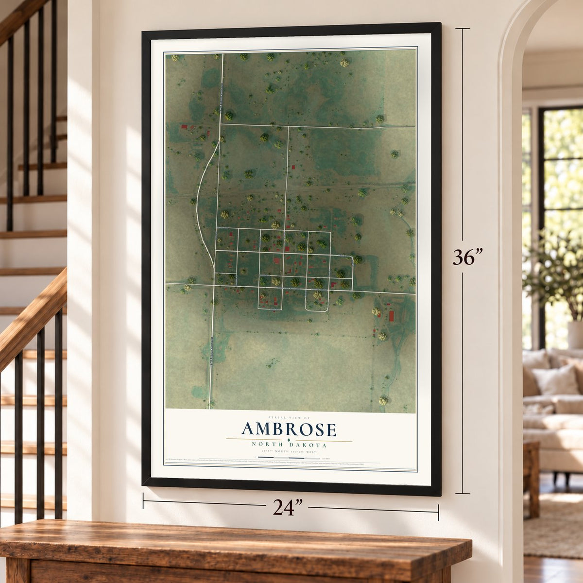 Ambrose, North Dakota map, 24 x 36 inch print in a black frame by a staircase