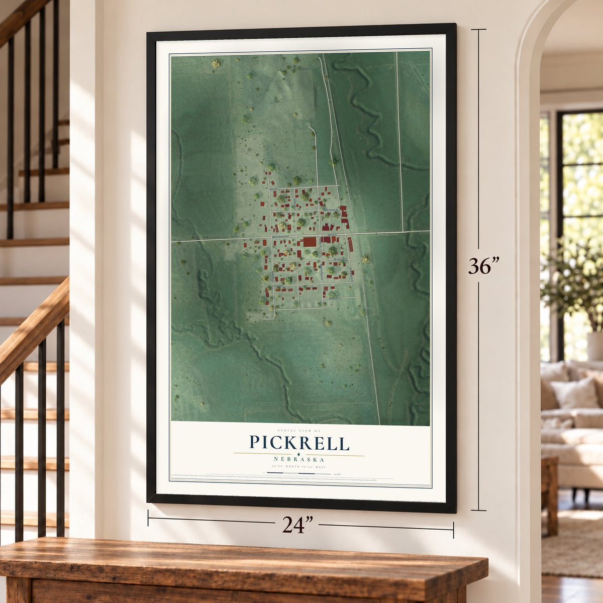 Pickrell, Nebraska map, 24 x 36 inch print in a black frame by a staircase