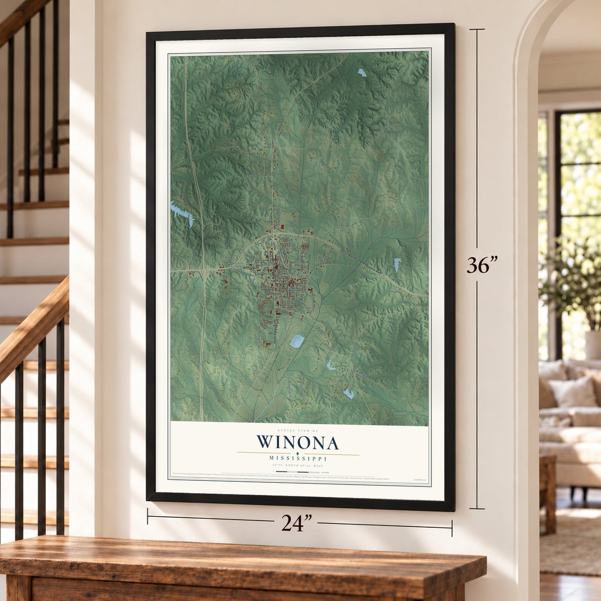 Winona, Mississippi map, 24 x 36 inch print in a black frame by a staircase