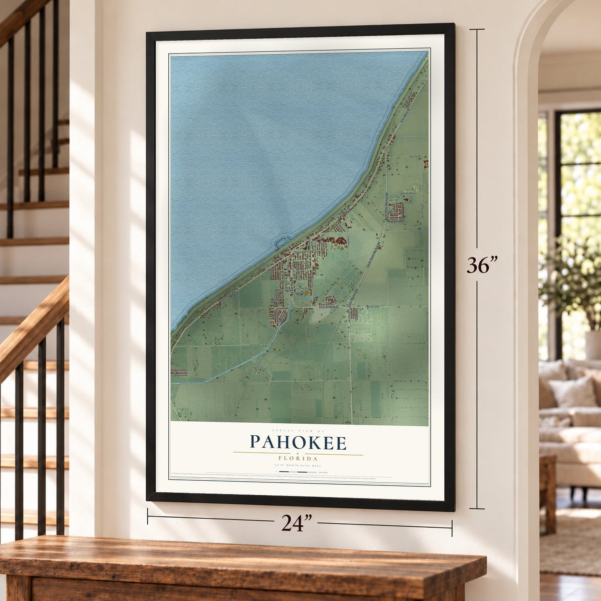 Pahokee, Florida map, 24 x 36 inch print in a black frame by a staircase