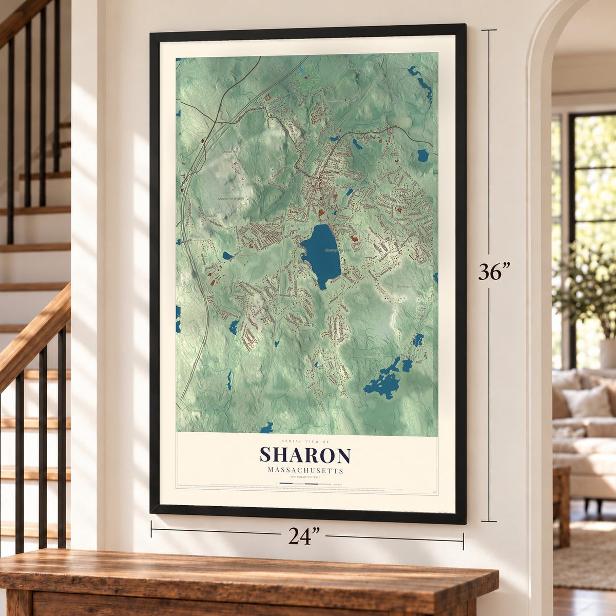Sharon, Massachusetts map, 24 x 36 inch print in a black frame by a staircase
