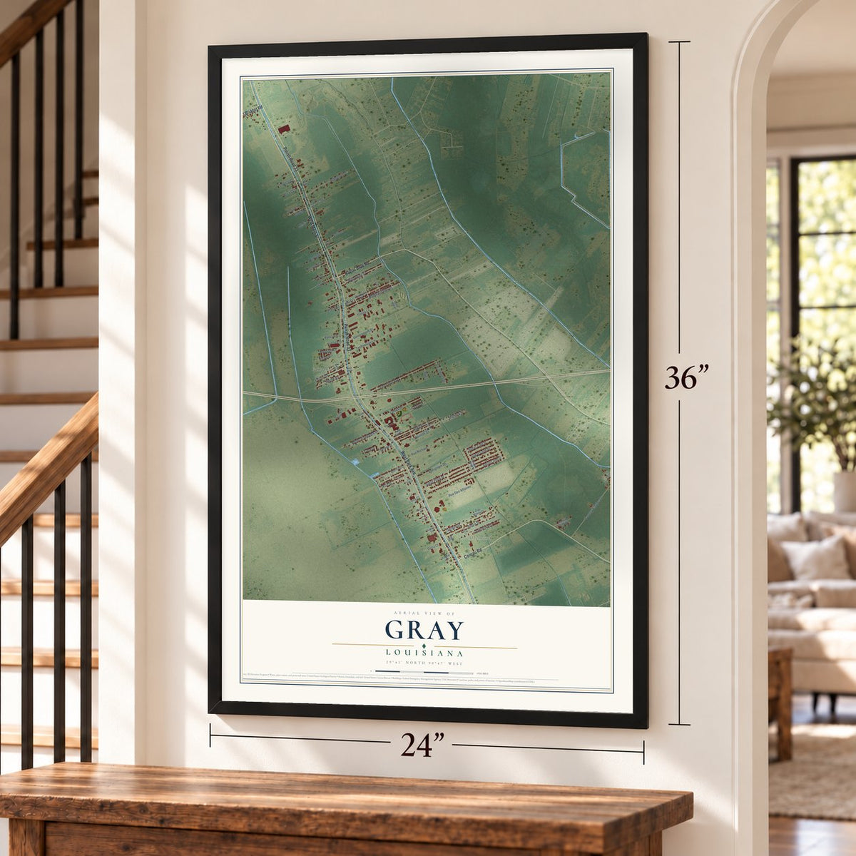 Gray, Louisiana map, 24 x 36 inch print in a black frame by a staircase