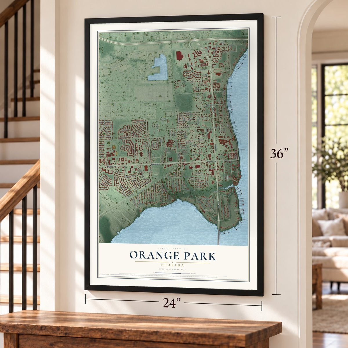 Orange Park, Florida map, 24 x 36 inch print in a black frame by a staircase