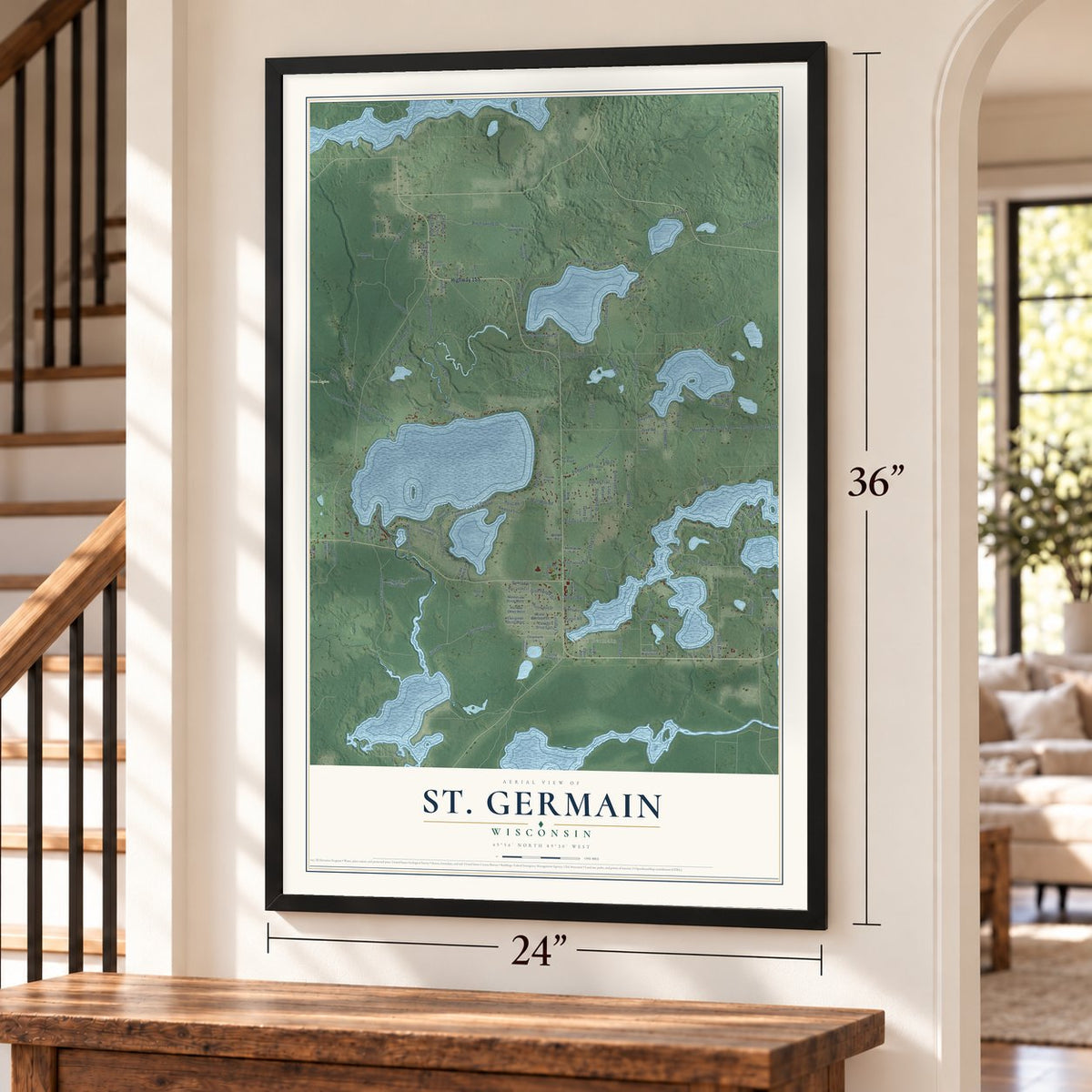 St. Germain, Wisconsin map, 24 x 36 inch print in a black frame by a staircase