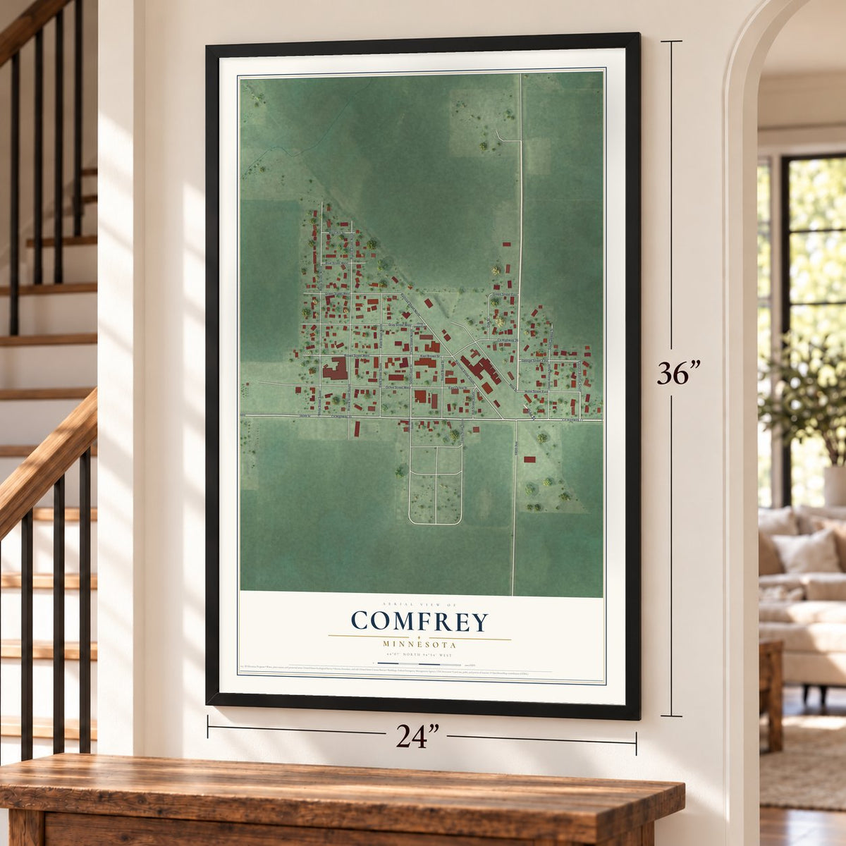 Comfrey, Minnesota map, 24 x 36 inch print in a black frame by a staircase