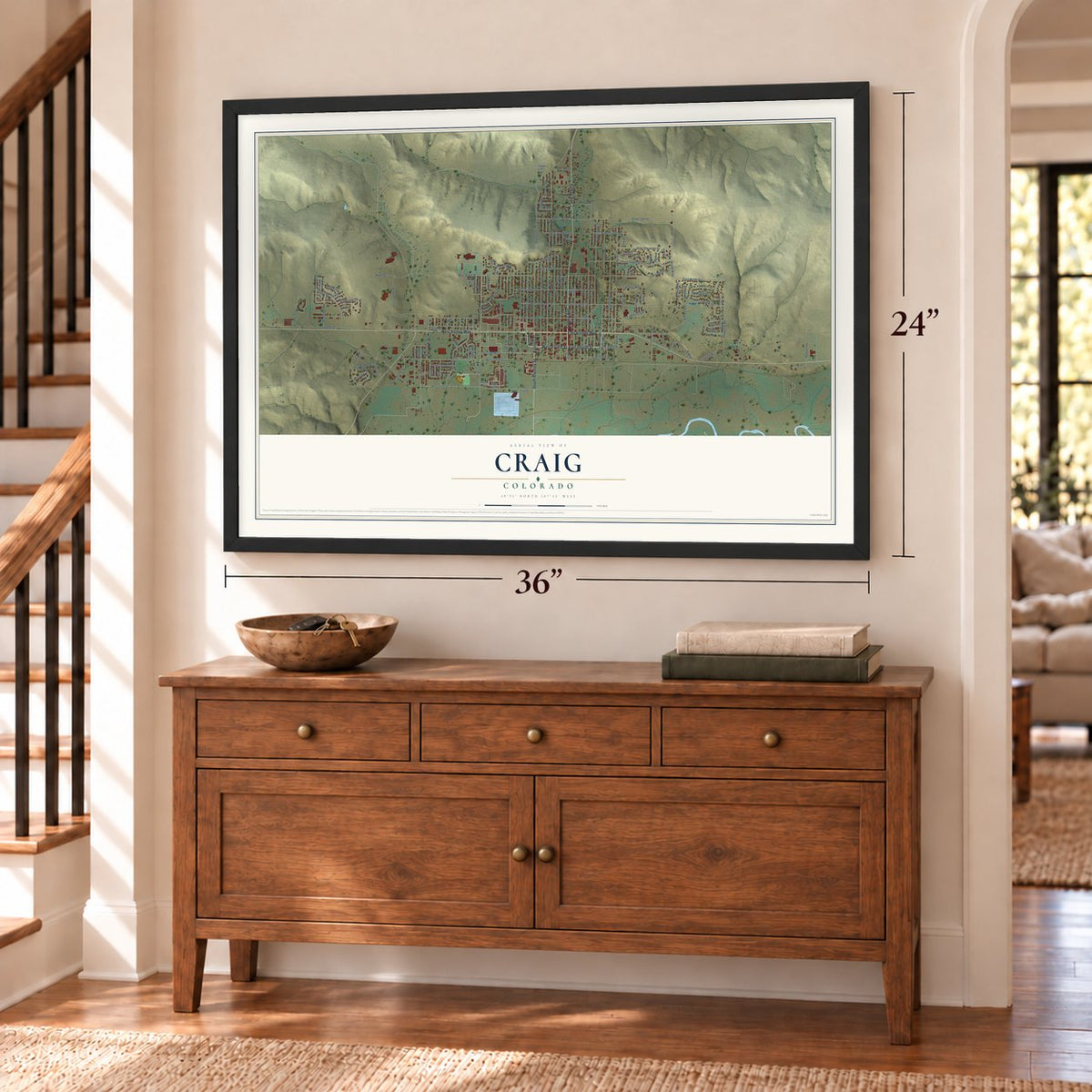 Craig, Colorado map, 24 x 36 inch print in a black frame above a dresser by a staircase