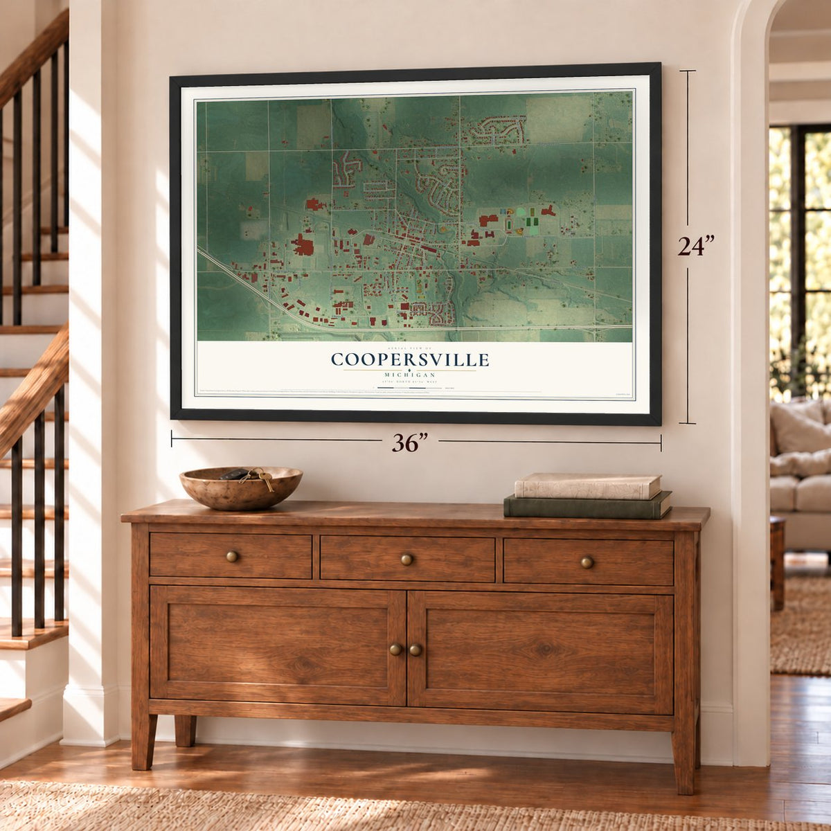 Coopersville, Michigan map, 24 x 36 inch print in a black frame above a dresser by a staircase