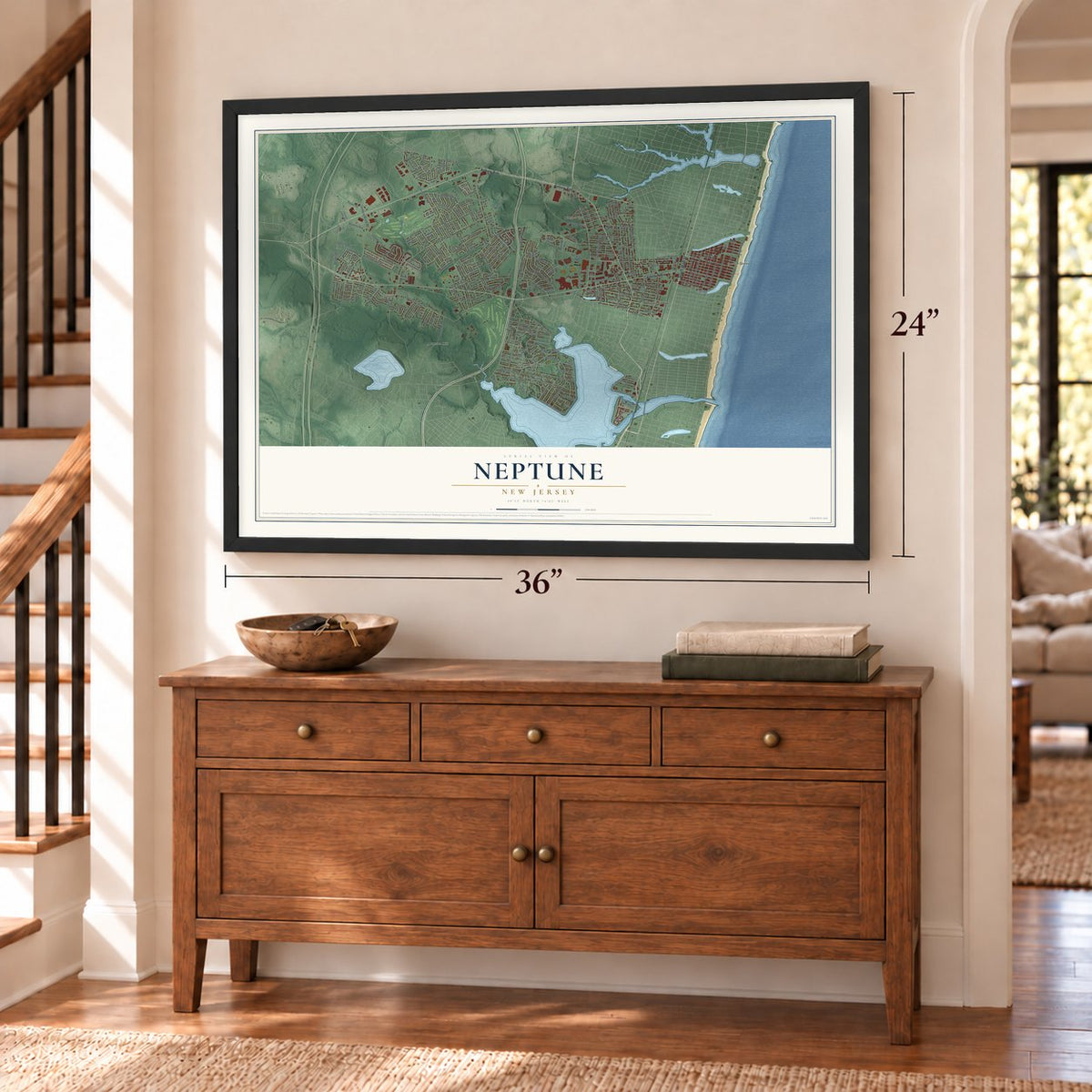 Neptune, New Jersey map, 24 x 36 inch print in a black frame above a dresser by a staircase