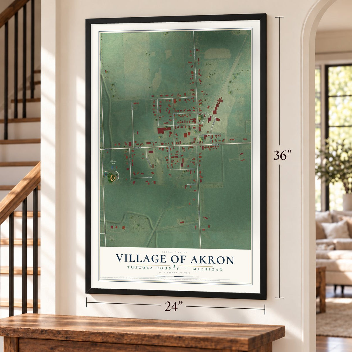 Akron, Michigan map, 24 x 36 inch print in a black frame by a staircase