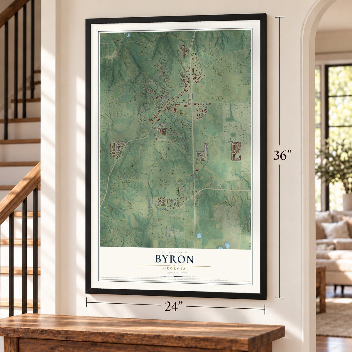 Byron, Georgia map, 24 x 36 inch print in a black frame by a staircase