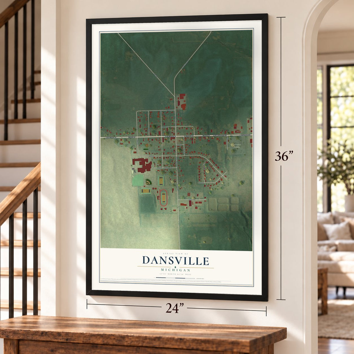 Dansville, Michigan map, 24 x 36 inch print in a black frame by a staircase