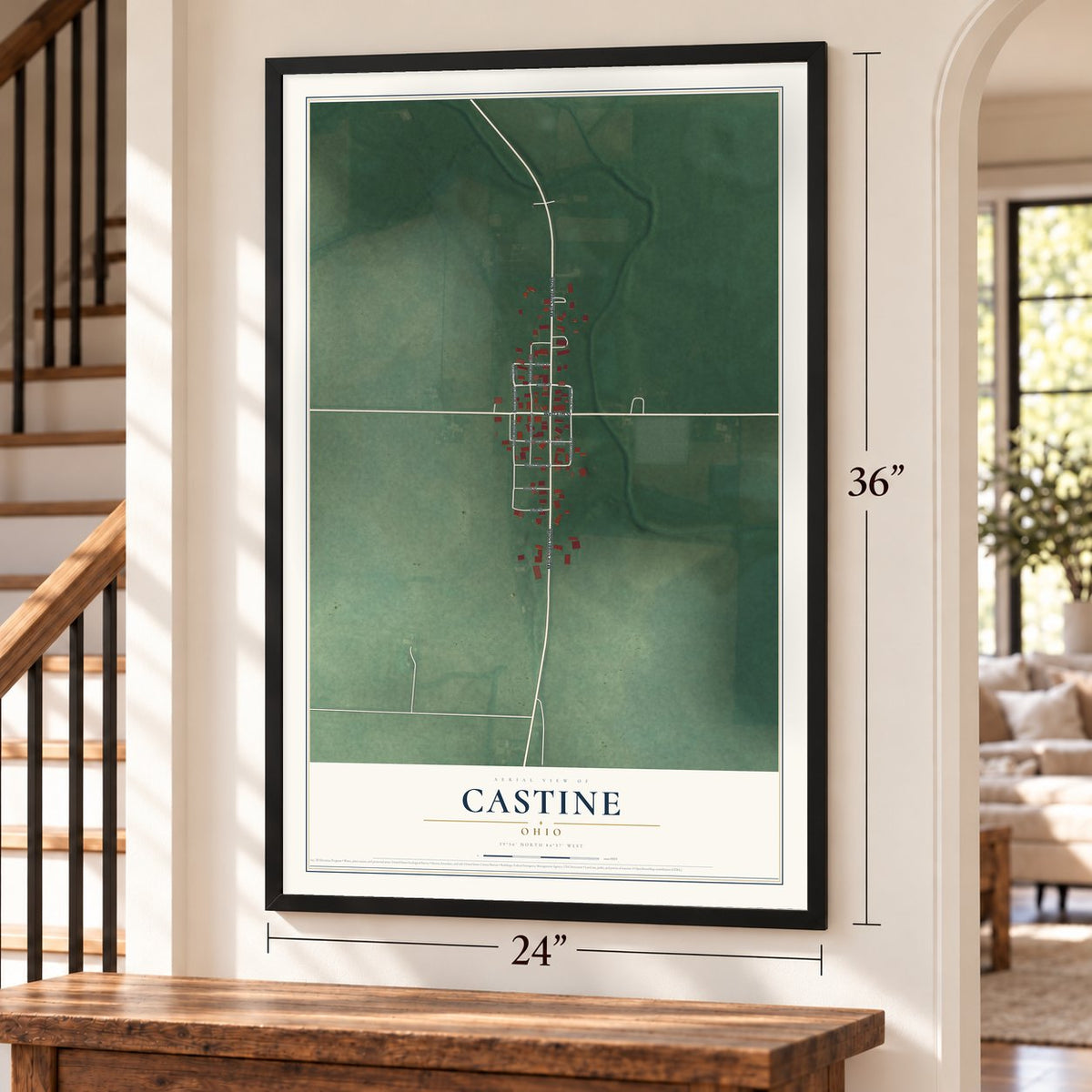 Castine, Ohio map, 24 x 36 inch print in a black frame by a staircase