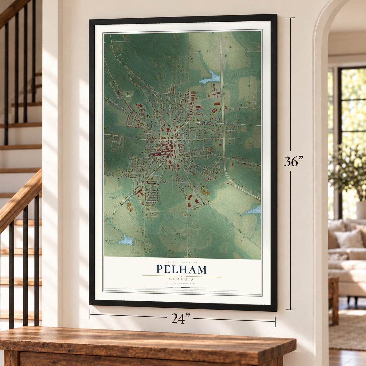 Pelham, Georgia map, 24 x 36 inch print in a black frame by a staircase