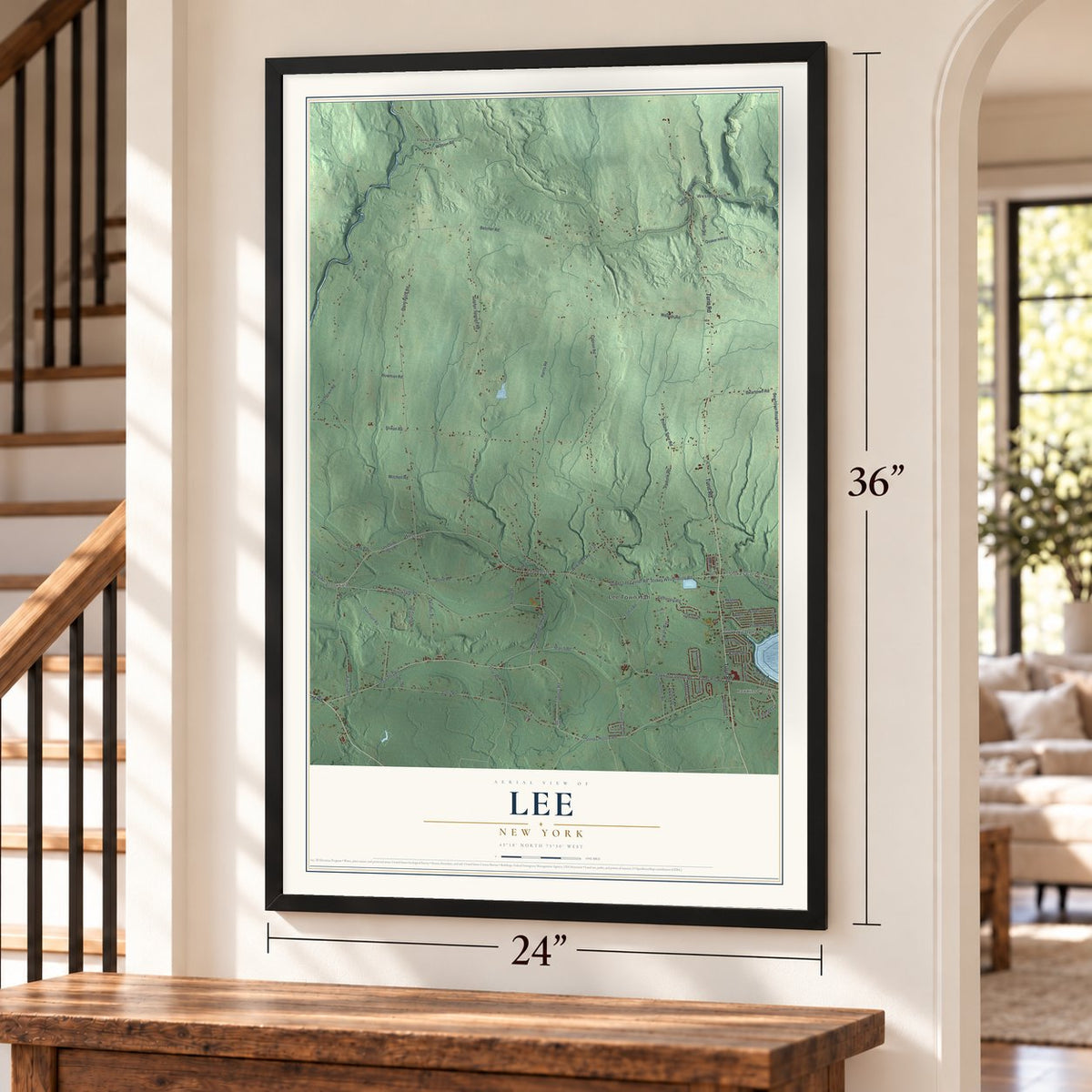 Lee, New York map, 24 x 36 inch print in a black frame by a staircase