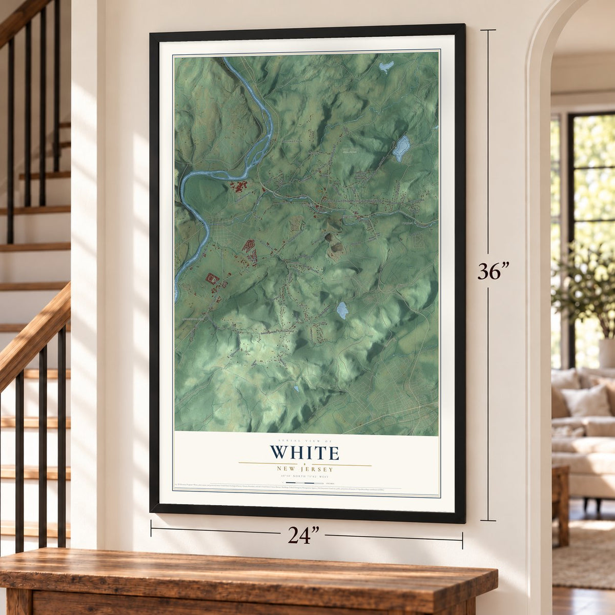 White, New Jersey map, 24 x 36 inch print in a black frame by a staircase