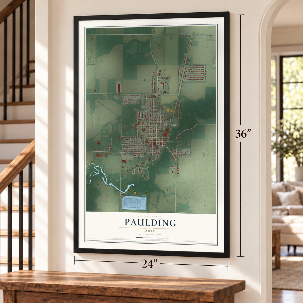 Paulding, Ohio map, 24 x 36 inch print in a black frame by a staircase