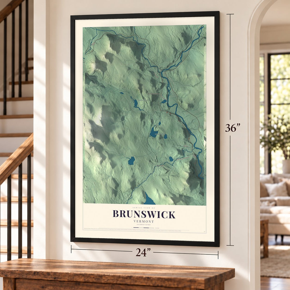 Brunswick, Vermont map, 24 x 36 inch print in a black frame by a staircase