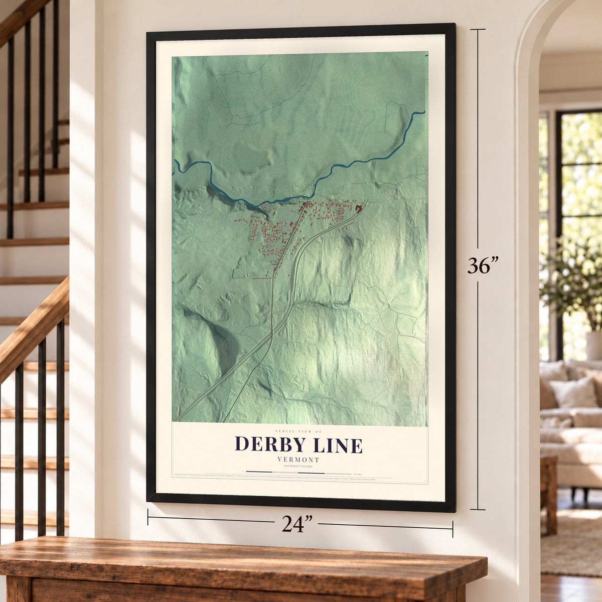 Derby Line, Vermont map, 24 x 36 inch print in a black frame by a staircase