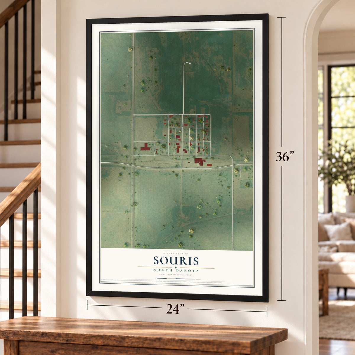 Souris, North Dakota map, 24 x 36 inch print in a black frame by a staircase