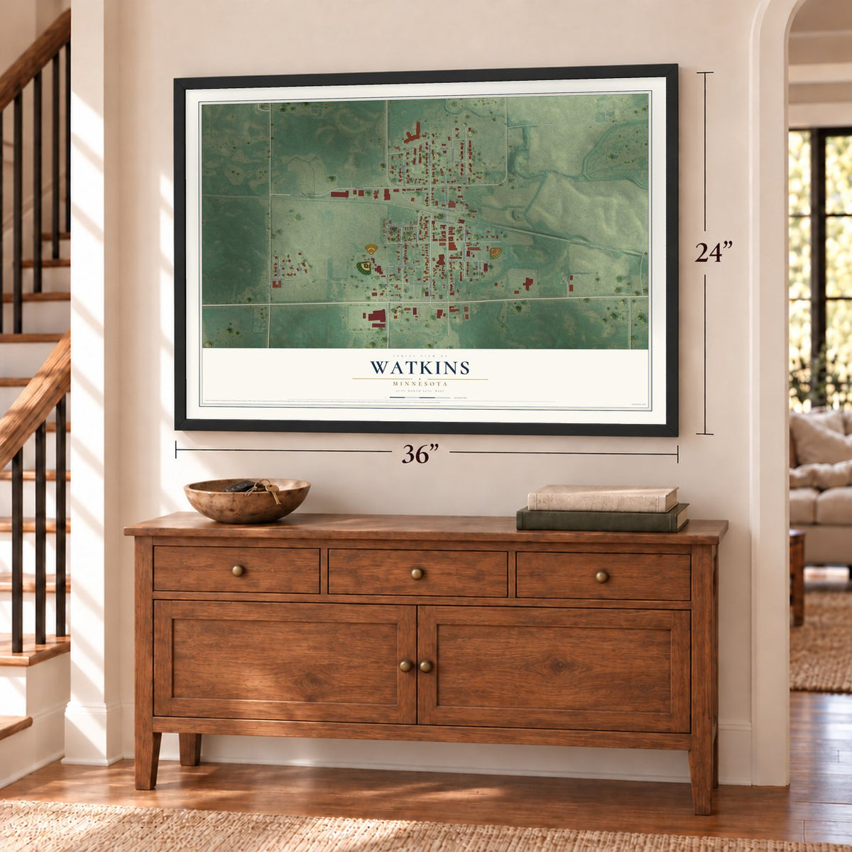 Watkins, Minnesota map, 24 x 36 inch print in a black frame above a dresser by a staircase