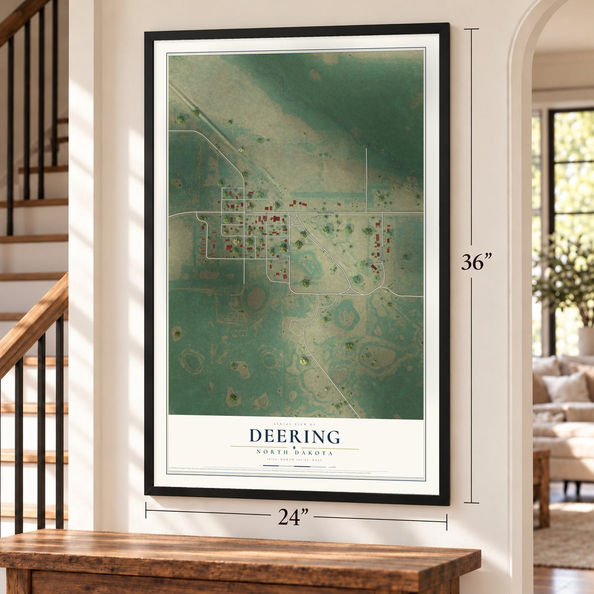 Deering, North Dakota map, 24 x 36 inch print in a black frame by a staircase