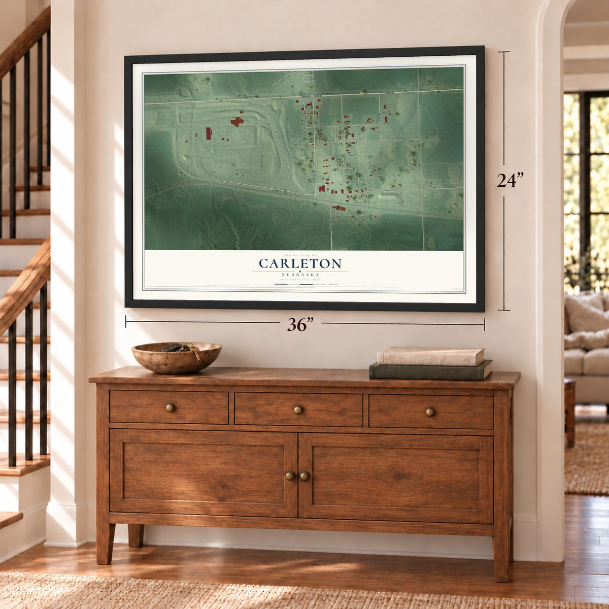 Carleton, Nebraska map, 24 x 36 inch print in a black frame above a dresser by a staircase