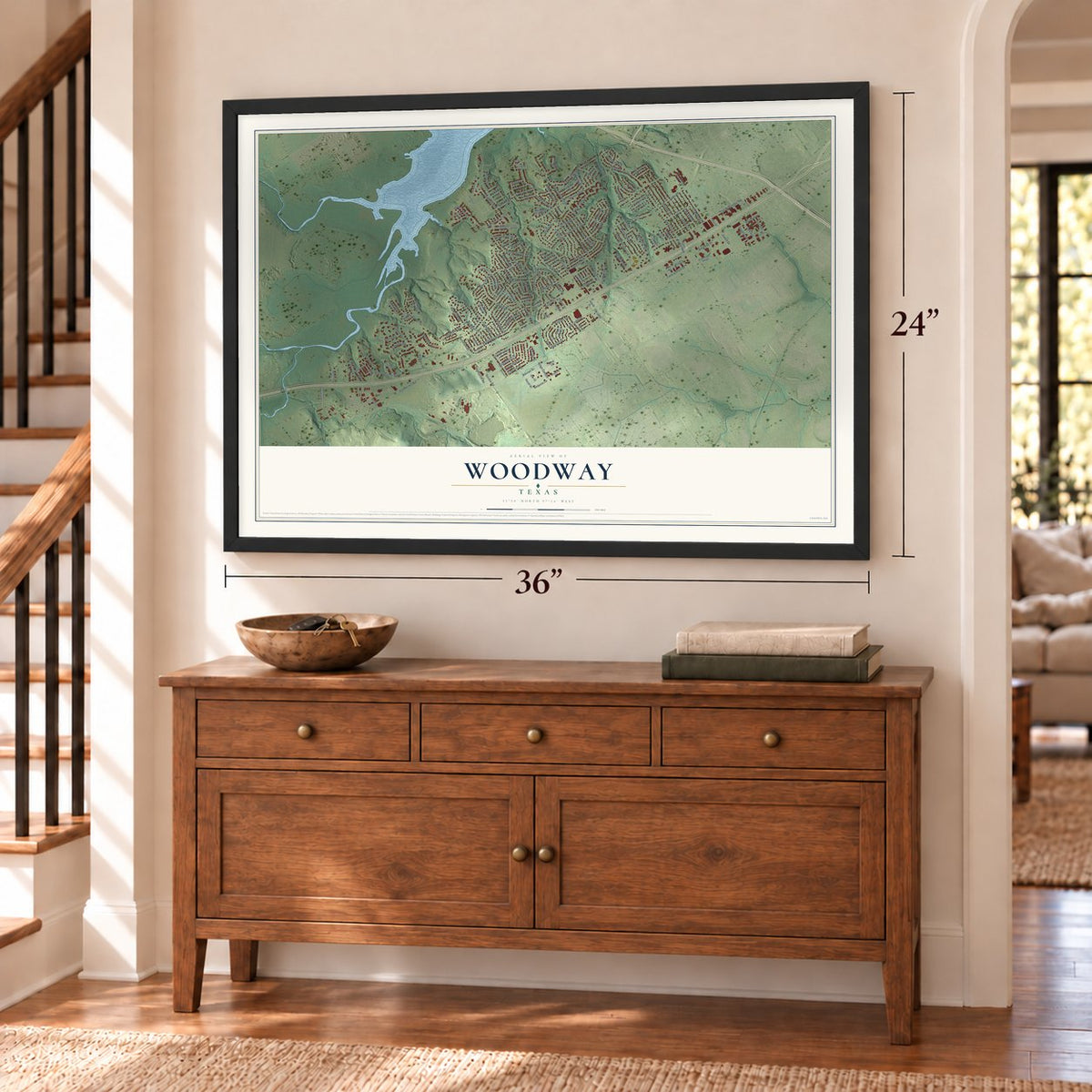 Woodway, Texas map, 24 x 36 inch print in a black frame above a dresser by a staircase