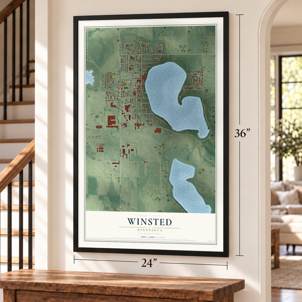 Winsted, Minnesota map, 24 x 36 inch print in a black frame by a staircase