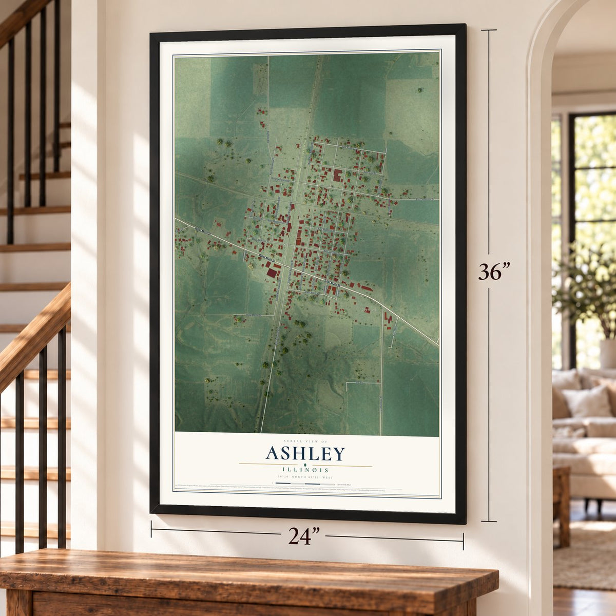 Ashley, Illinois map, 24 x 36 inch print in a black frame by a staircase