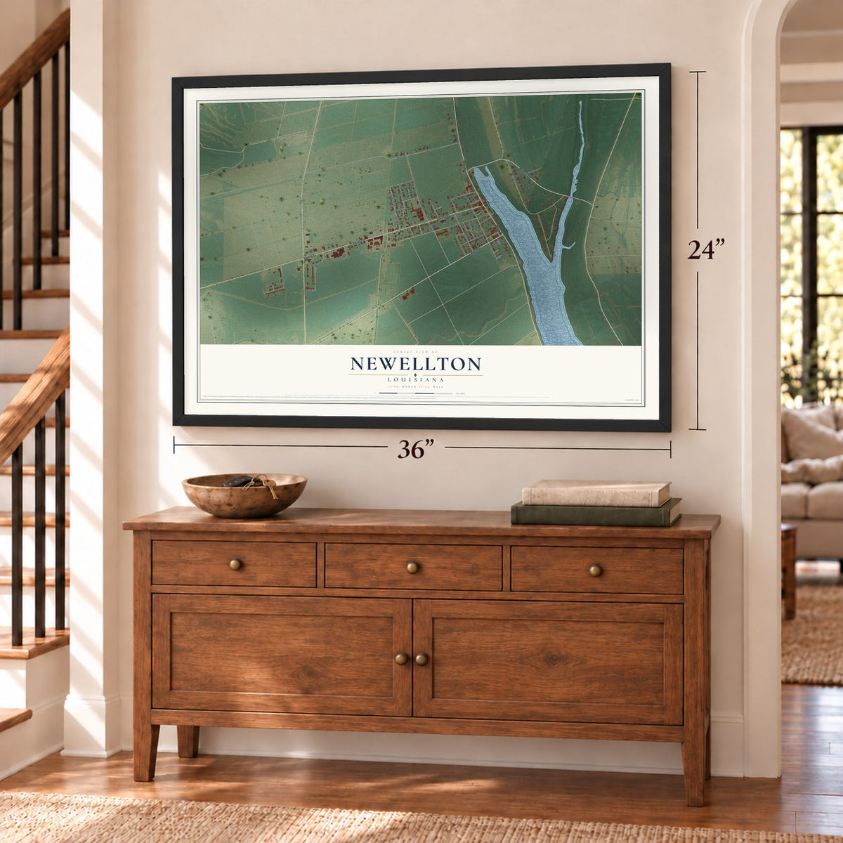 Newellton, Louisiana map, 24 x 36 inch print in a black frame above a dresser by a staircase