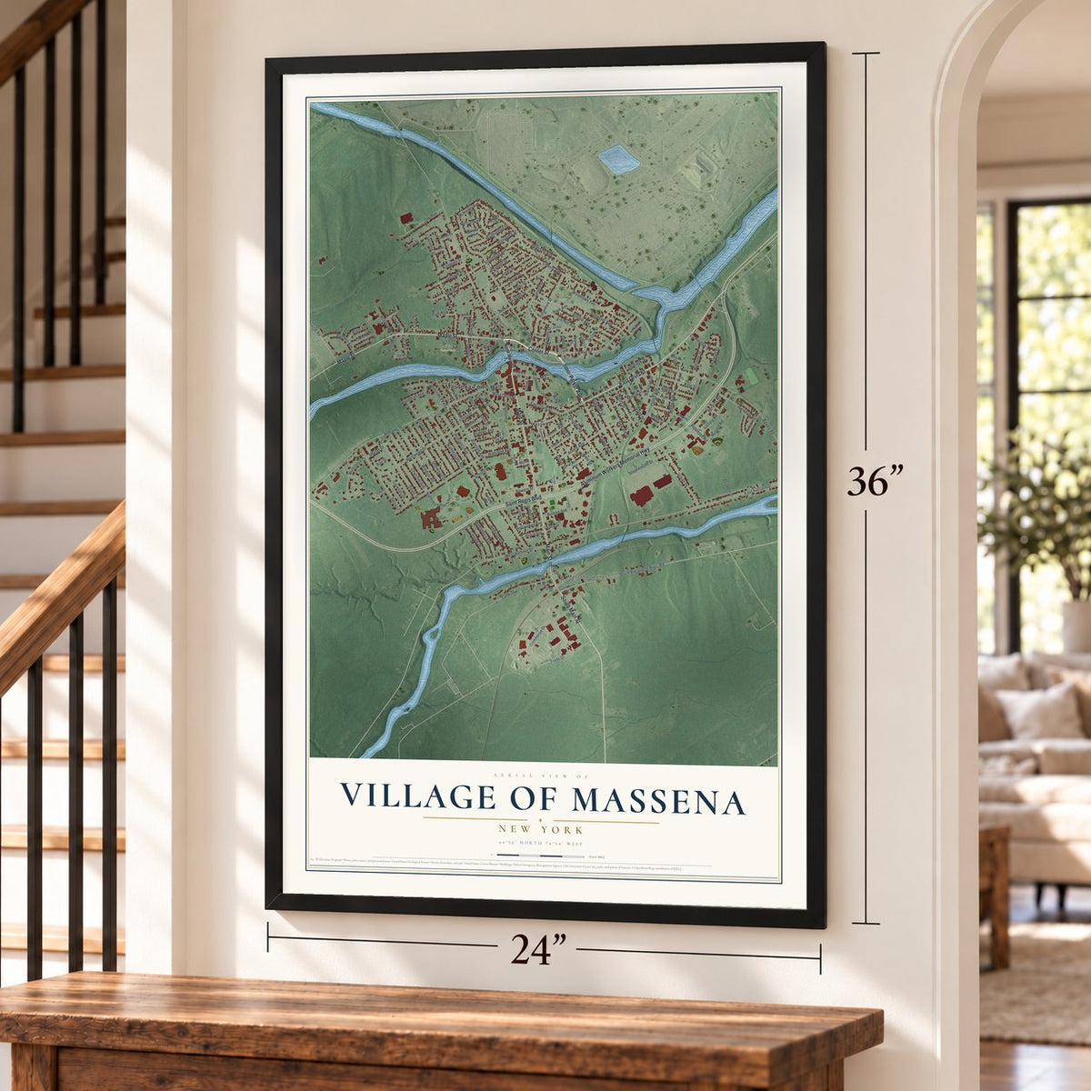 Village of Massena, New York map, 24 x 36 inch print in a black frame by a staircase