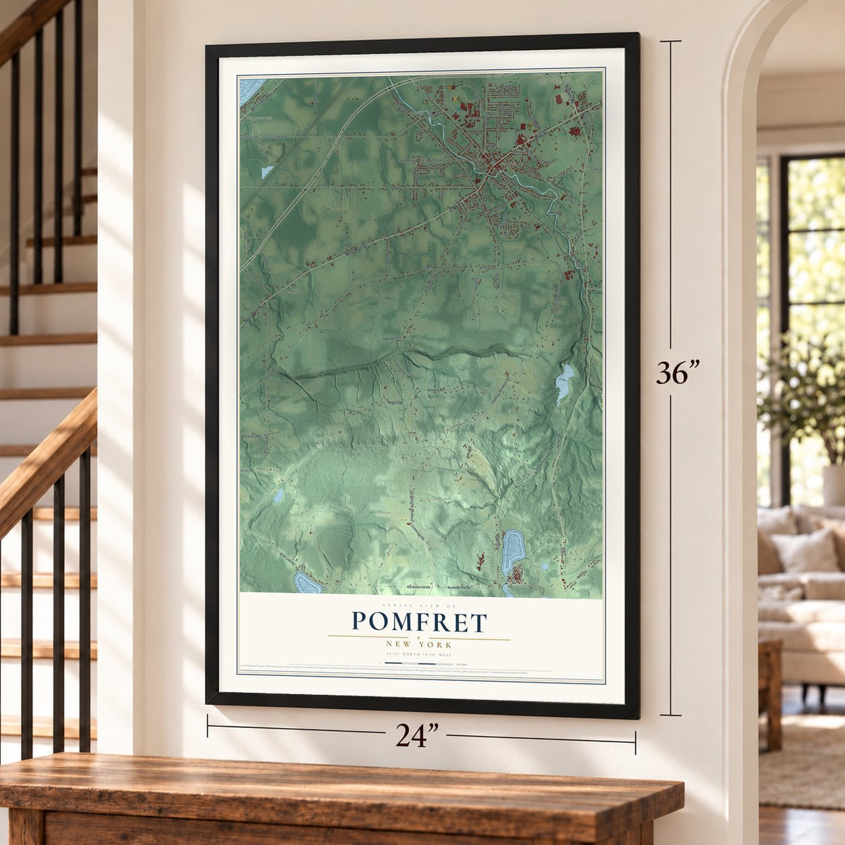 Pomfret, New York map, 24 x 36 inch print in a black frame by a staircase