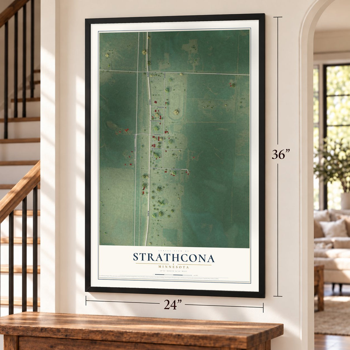 Strathcona, Minnesota map, 24 x 36 inch print in a black frame by a staircase