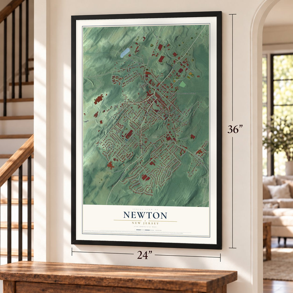 Newton, New Jersey map, 24 x 36 inch print in a black frame by a staircase