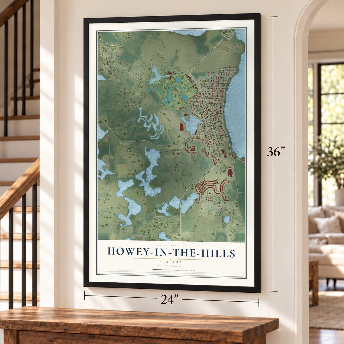 Howey-in-the-Hills, Florida map, 24 x 36 inch print in a black frame by a staircase