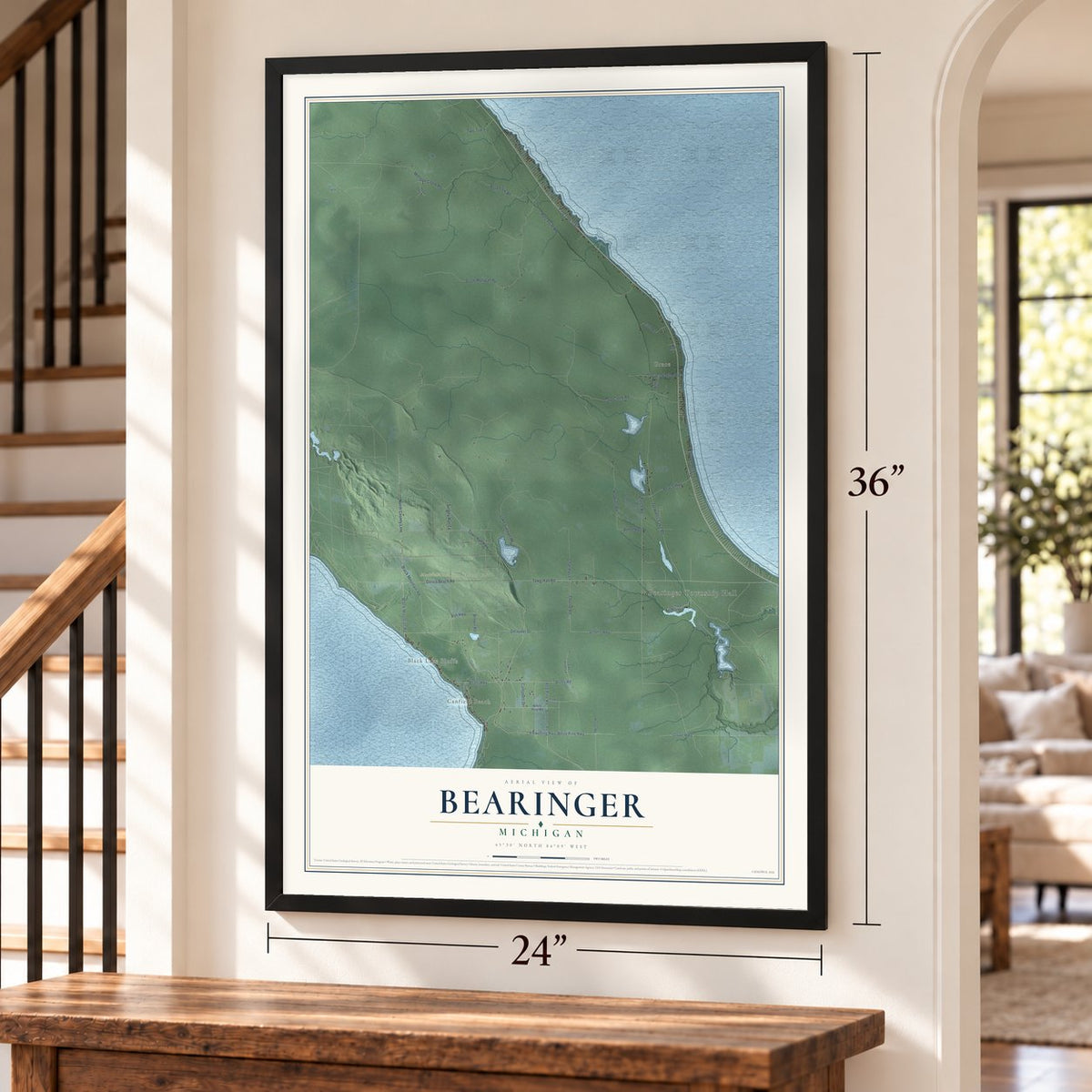 Bearinger, Michigan map, 24 x 36 inch print in a black frame by a staircase