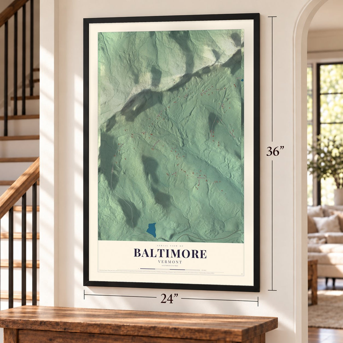 Baltimore, Vermont map, 24 x 36 inch print in a black frame by a staircase