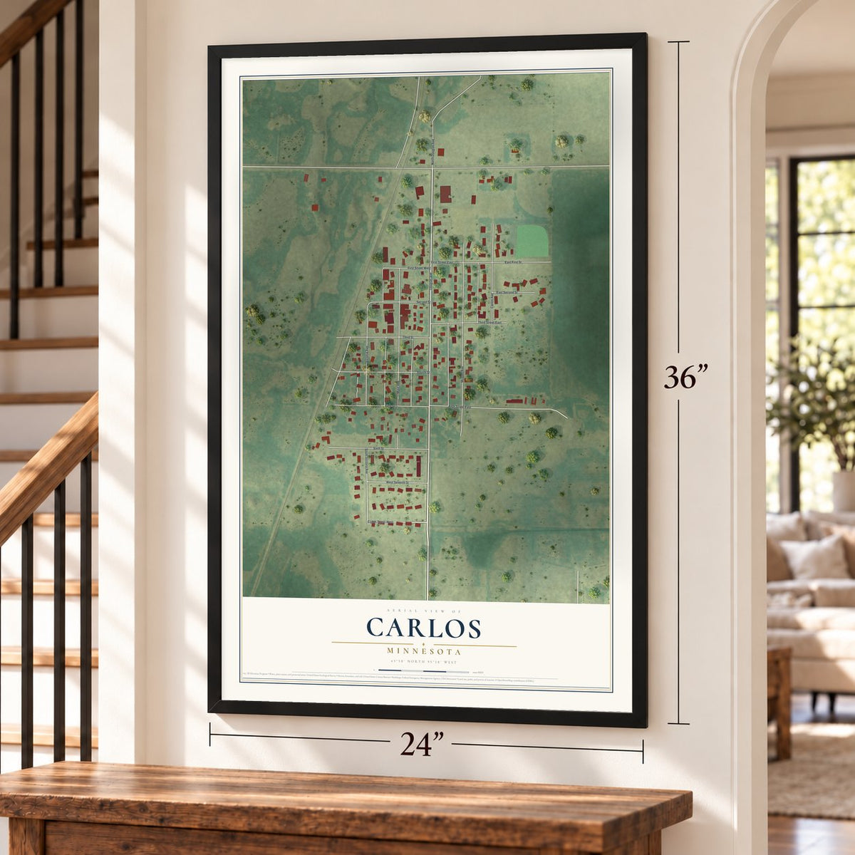 Carlos, Minnesota map, 24 x 36 inch print in a black frame by a staircase