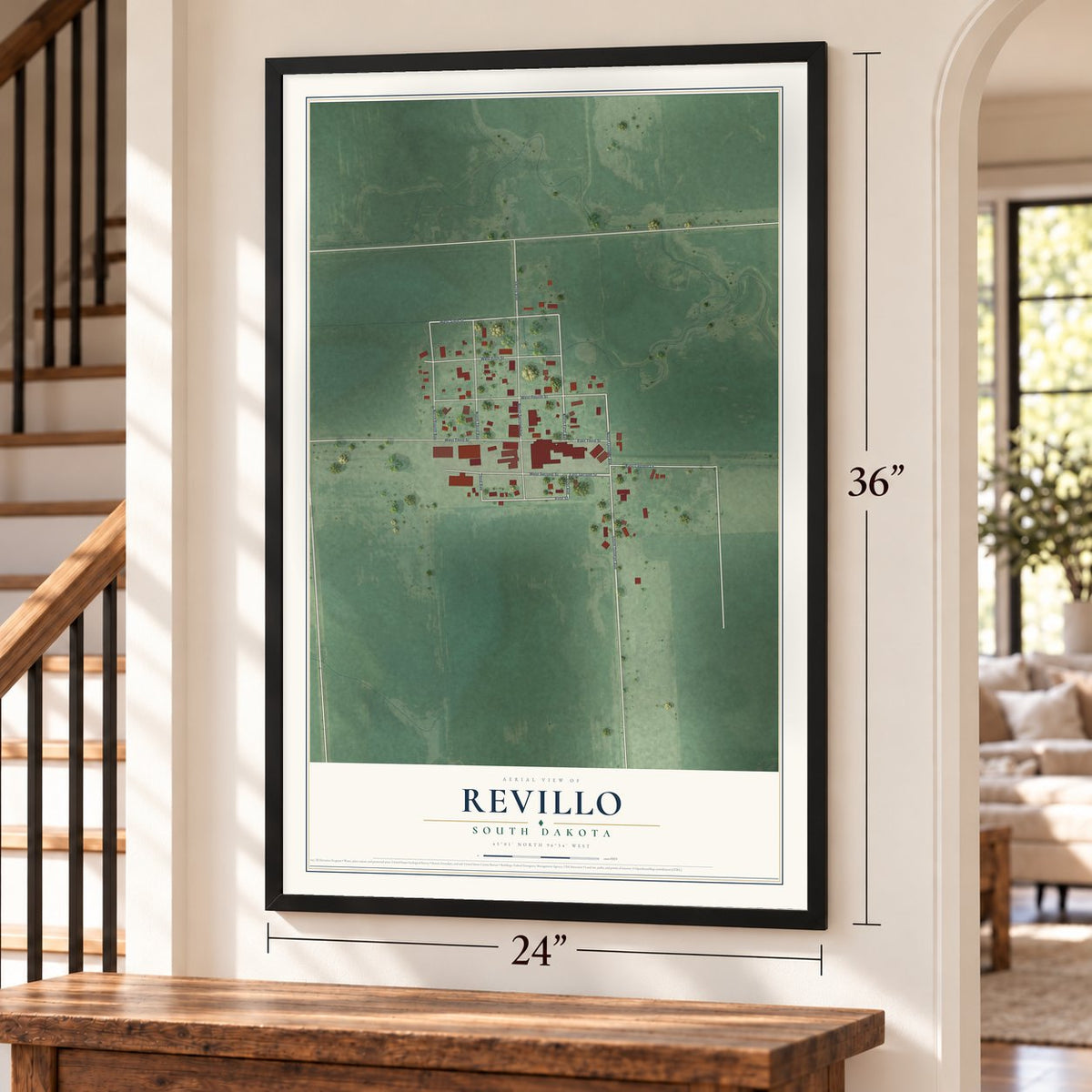 Revillo, South Dakota map, 24 x 36 inch print in a black frame by a staircase