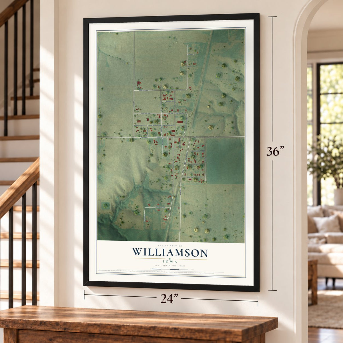 Williamson, Iowa map, 24 x 36 inch print in a black frame by a staircase