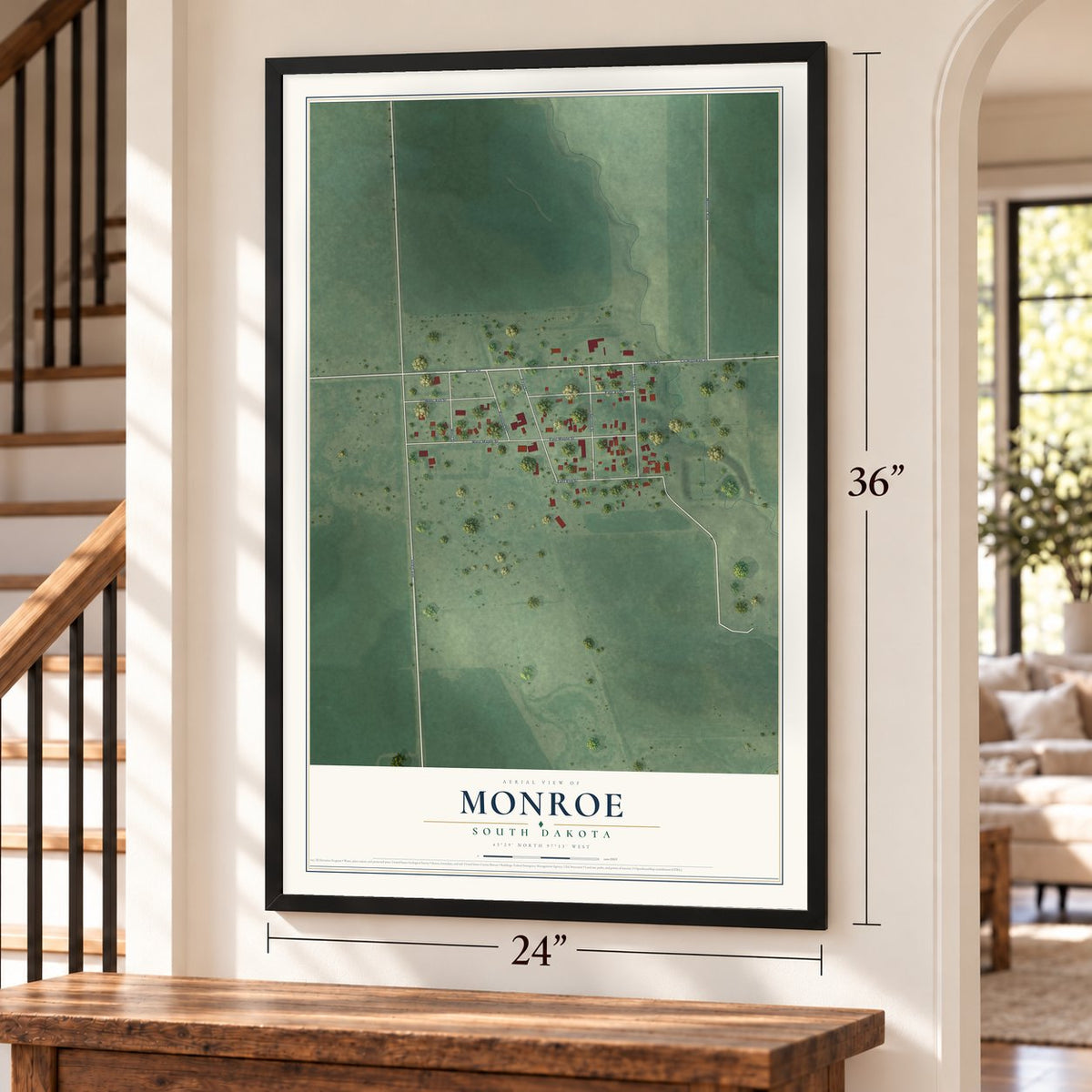 Monroe, South Dakota map, 24 x 36 inch print in a black frame by a staircase