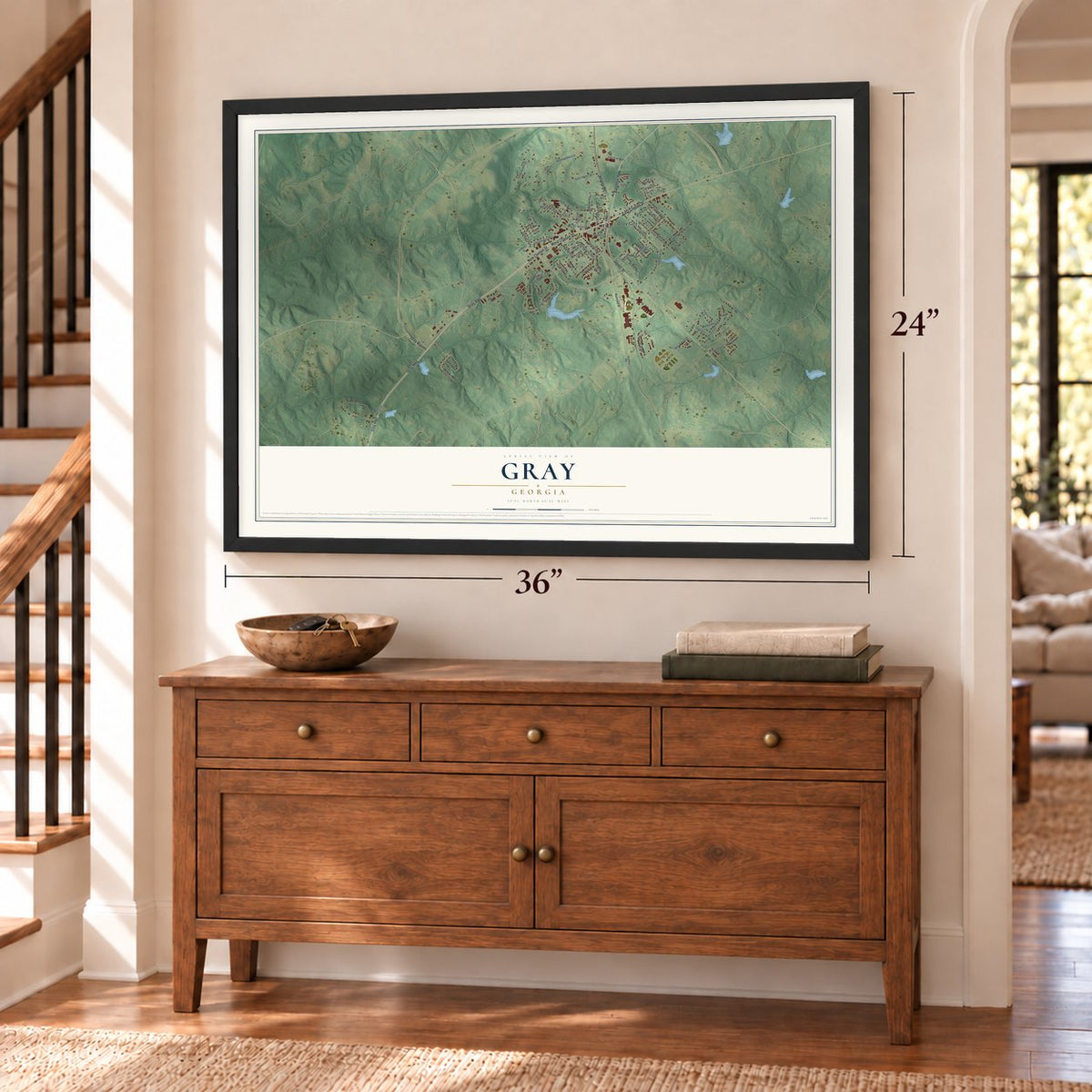 Gray, Georgia map, 24 x 36 inch print in a black frame above a dresser by a staircase