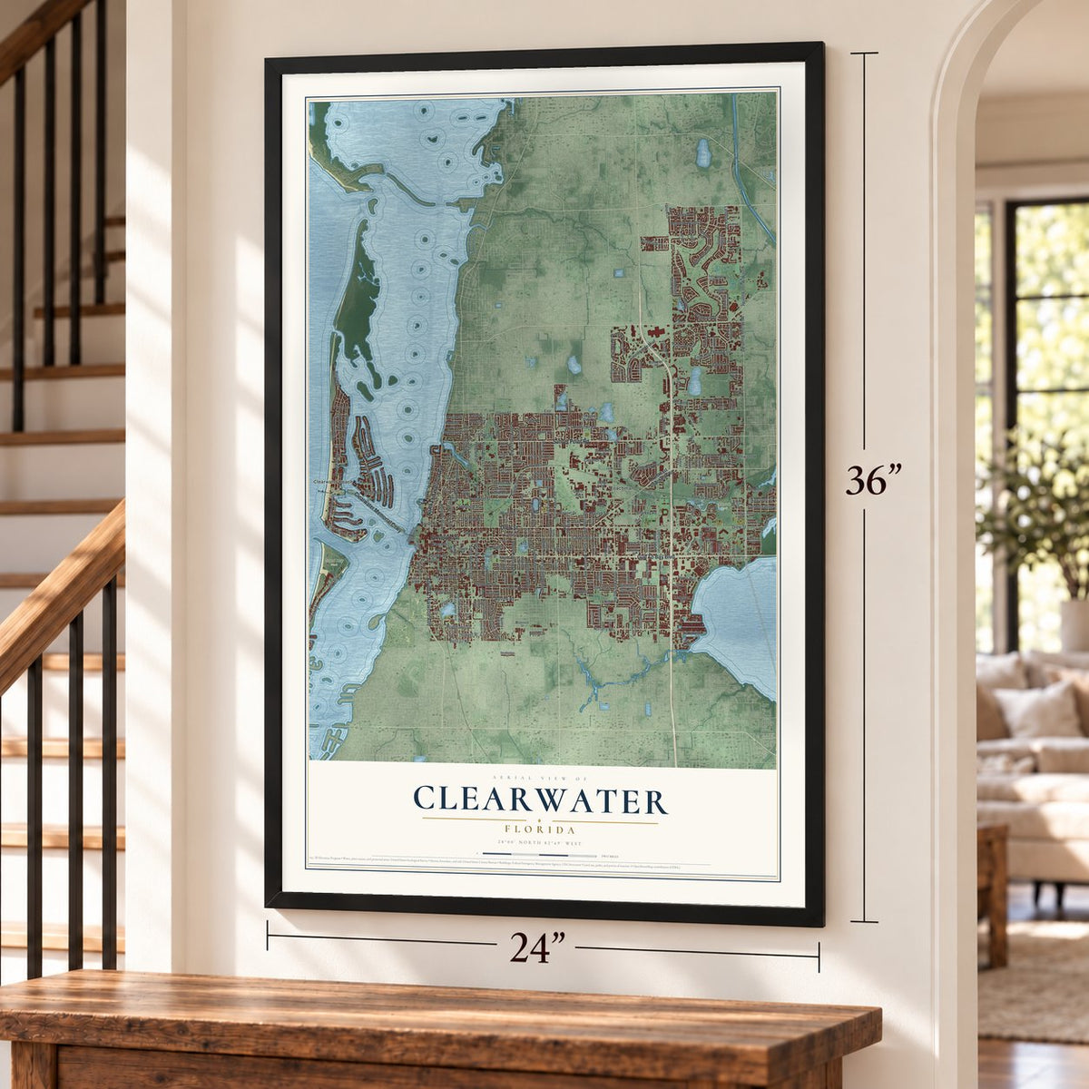 Clearwater, Florida map, 24 x 36 inch print in a black frame by a staircase
