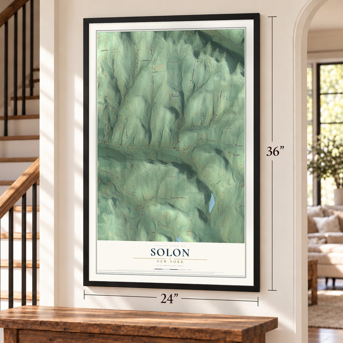 Solon, New York map, 24 x 36 inch print in a black frame by a staircase